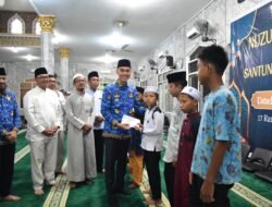 Bupati OKI Hadiri Peringatan Nuzulul Qur’an dan Santunan Anak Yatim di Masjid Agung Sholihin