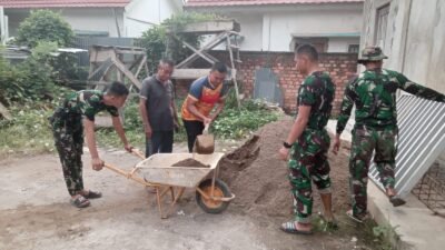 Progres Pembangunan Pos Keamanan Mushola Baitul Maksurin Terus Dikebut Satgas TMMD ke-129 Kodim 0418/Palembang