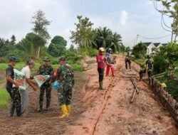 TMMD Ke-129 Tak Sekadar Bangun Jalan, Warga Talang Jambe Diajak Panen Lahan Sendiri 