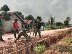 Terik Matahari Tak Surutkan Langkah Satgas TMMD Kodim 0418/Palembang Bangun Jalan 750 Meter di Talang Jambe