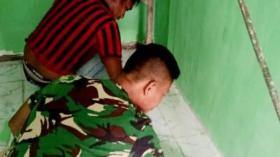 TMMD Ke- 129 Kodim 0418/ Palembang: Cat Hijau Ubah Wajah Rumah Ibu Sriyanti, Suasana Baru Mulai Terasa